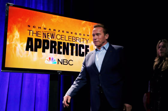 Image: Host Arnold Schwarzenegger walks on stage to participate in a panel for \"The New Celebrity Apprentice\" in Universal City, California, Dec. 9, 2016.