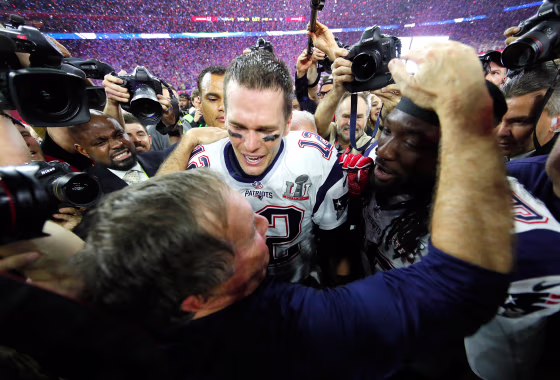 Super Bowl LI - Head coach Bill Belichick, Tom Brady #12 and LeGarrette Blount #29 of the New England Patriots celebrate