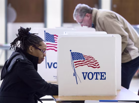 People vote in the Super Tuesday primary at Centreville High School March 1, 2016, in Centreville, Virginia.