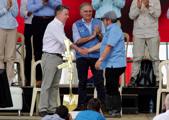 Image: FARC leader Londono, President Santos and UN special rep. Arnault Attend the Final Act of Abandonment of Arms in Mesetas