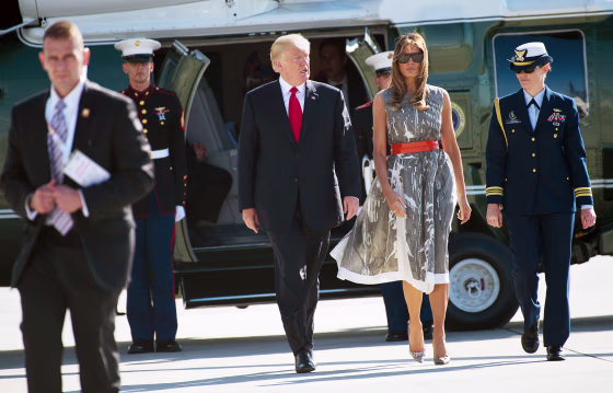 Image: US President Donald Trump and US First Lady Melania Trump make their way from Marine One to board Airforce One