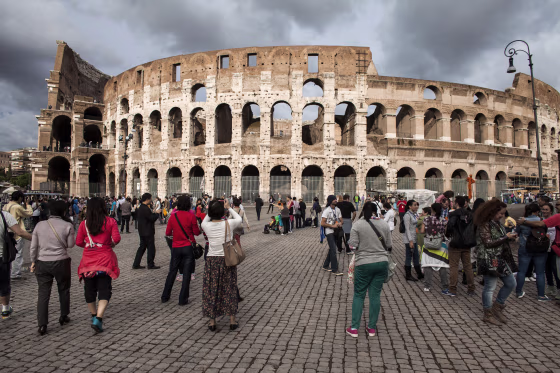 Image: Tourists visit the Colosseum in Rome
