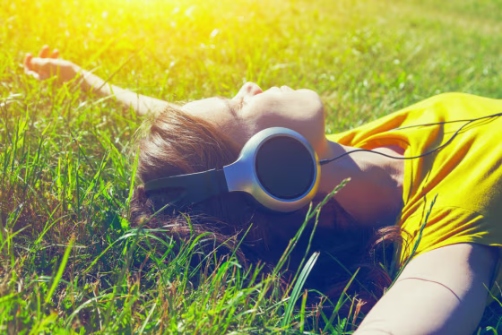 Image: A woman listens to music