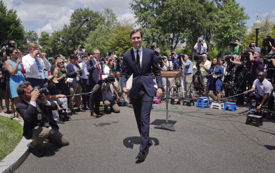 Image: White House senior adviser Jared Kushner walks away from the podium after speaking to reporters