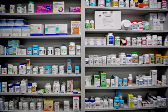 Image: FILE PHOTO - Bottles of medications line the shelves at a pharmacy in Portsmouth