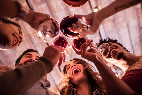 Image: Below View of Group of Friends Toasting with Wine