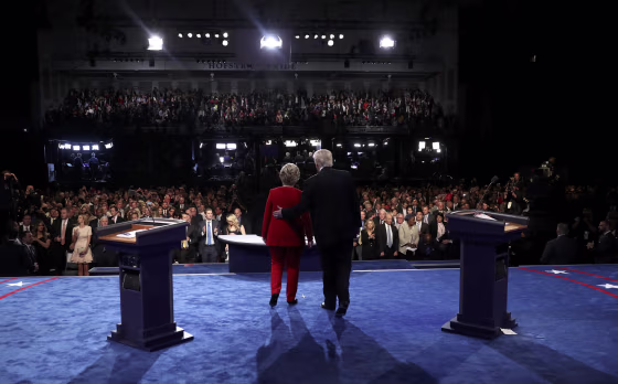 Image: Republican U.S. presidential nominee Donald Trump stands with Democratic U.S. presidential nominee Hillary Clinton at the conclusion of their first presidential debate at Hofstra University in Hempstead
