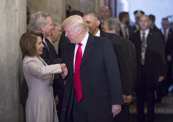 Image: President-elect Donald Trump greets House Minority Leader Nancy Pelosi