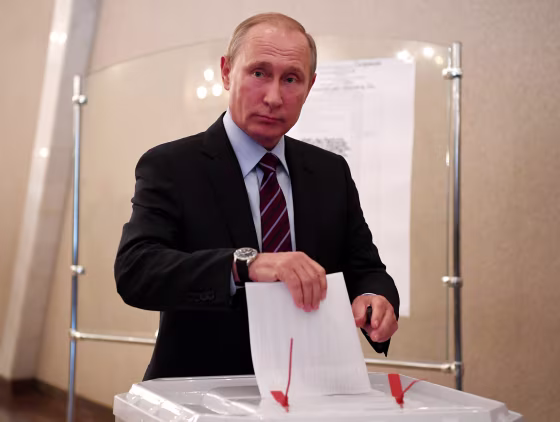 Image: Vladimir Putin votes in a municipal election on Sept. 10, 2017