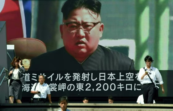 Image: Kim Jong Un's image on a video screen in Tokyo