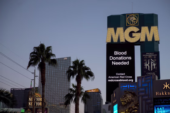 Image: A message about blood donations for the victims of Sunday night's mass shooting is displayed on the marquee of the MGM Grand Hotel and Casino