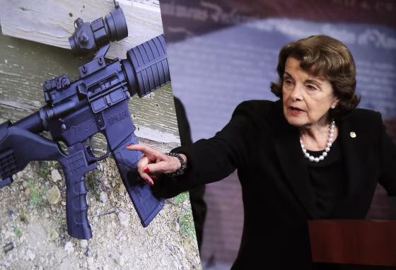 Image: Dianne Feinstein peaks during a news conference about gun legislation