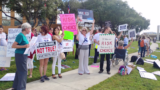 Anti-vaccine activists demonstrate in Houston in August 2017. They don't believe the preponderance of evidence that vaccines are safe and will protect children and adult against life-threatening diseases, and are becoming bolder in their outreach.