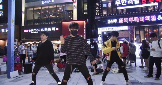 Yang Seung Ho's K-pop dance group performs in Seoul's Hongdae district on Thursday.