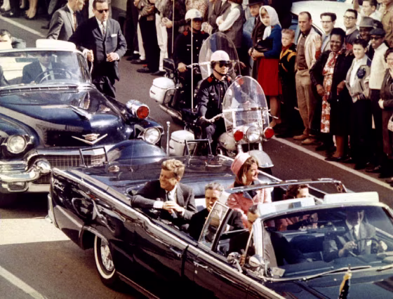 Image: President John F. Kennedy, First Lady Jaqueline Kennedy and Texas Governor John Connally ride  in a liousine moments before Kennedy was assassinated, in Dallas