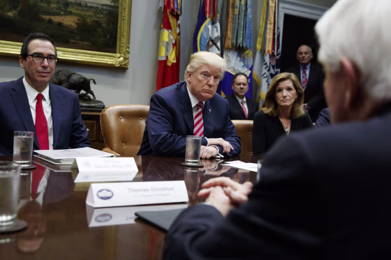 Image: Trump listens during a meeting on tax policy with business leaders