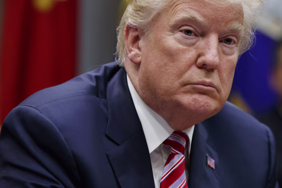 Image: Trump listens during a meeting on tax policy