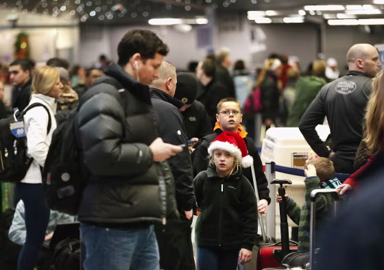 Image: Holiday Travelers Crowd Airports Ahead Of The Holidays