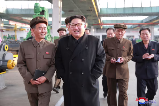 Image: North Korean leader Kim Jong Un visits a factory in this undated picture provided by KCNA in Pyongyang