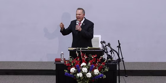 Image: Embattled GOP Senate Candidate Judge Roy Moore Attends Church Revival Service At Baptist Church In Jackson, Alabama