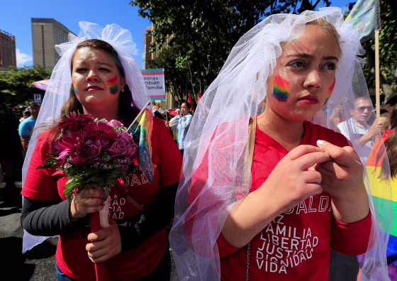 Image: People attend an annual gay pride parade in Bogota, Colombia