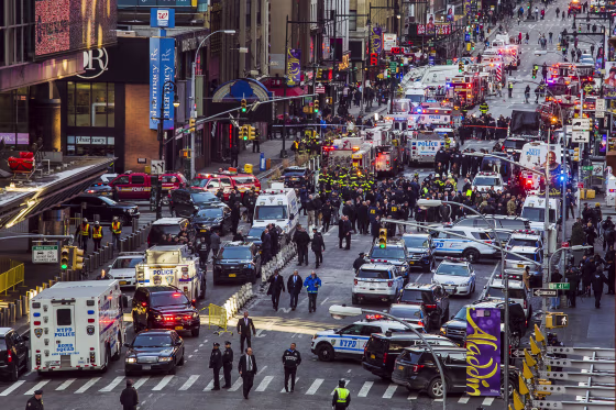 Image: Law enforcement officials work following an explosion