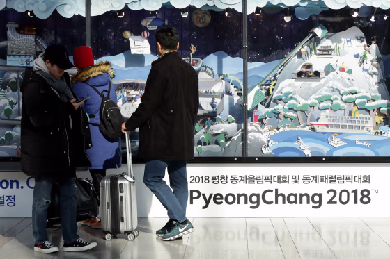 Image: People watch the 2018 PyeongChang Winter Olympic and Paralympic Games PR booth on Jan. 5, 2018 in Seoul, South Korea.