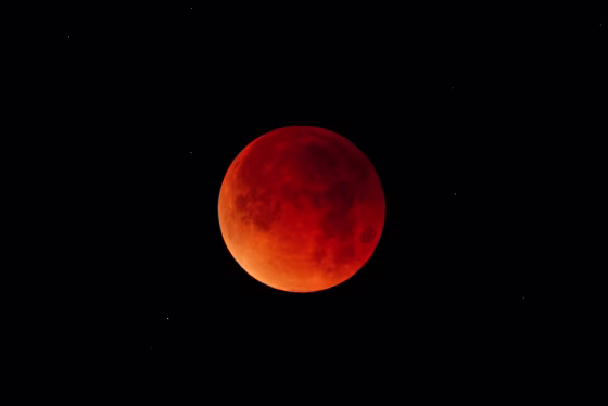 Image: Stars can be seen around a lunar eclipse in Oceanside, California
