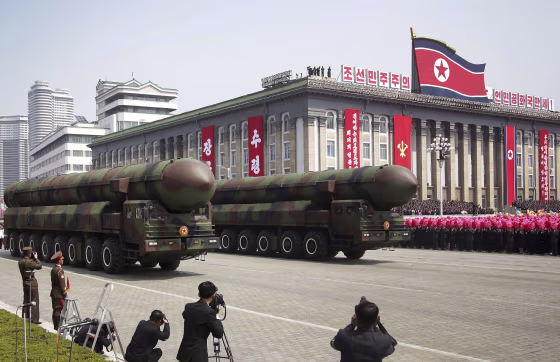 Image: Missiles are paraded across Kim Il Sung Square during a military parade