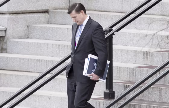 Image: Trump transition team member Rob Porter walks outside the Eisenhower Executive Office Building following meetings, at the White House complex in Washington, DC, Jan. 13, 2017.