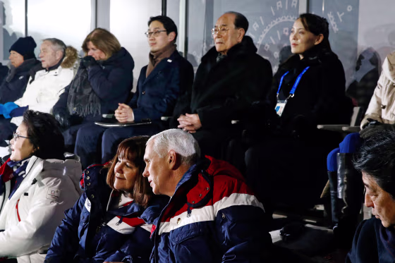 Vice President Mike Pence talks with his wife Karen at the Winter Olympics just a row in front of Kim Yo Jong, sister of North Korean leader Kim Jong Un.