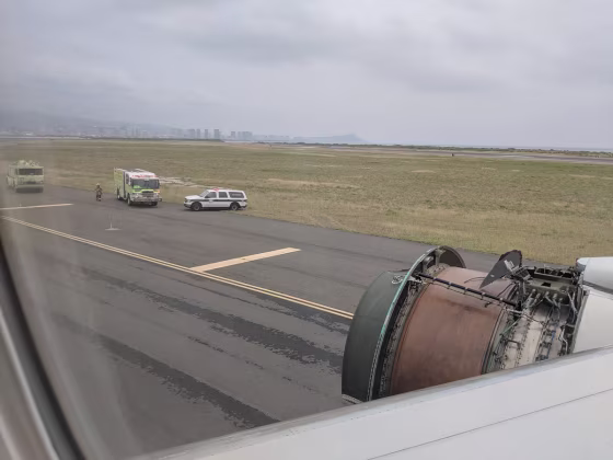 Image: Erik Haddad's view outside the window of his United flight 1175 showed the lost cowling on the right engine, on Feb. 13, 2018.