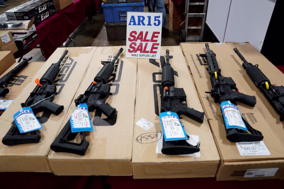 Image: AR-15 rifles on display at gun show