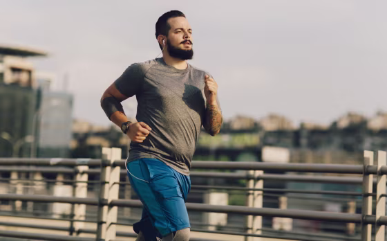 Image: A man runs