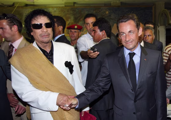Image: Nicolas Sarkozy and Muammar Gadhafi