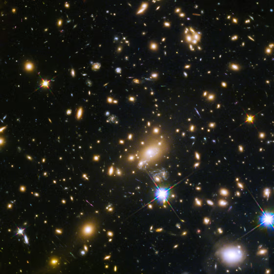 This image shows the huge galaxy cluster MACS J1149.5+223, whose light took over 5 billion years to reach us.