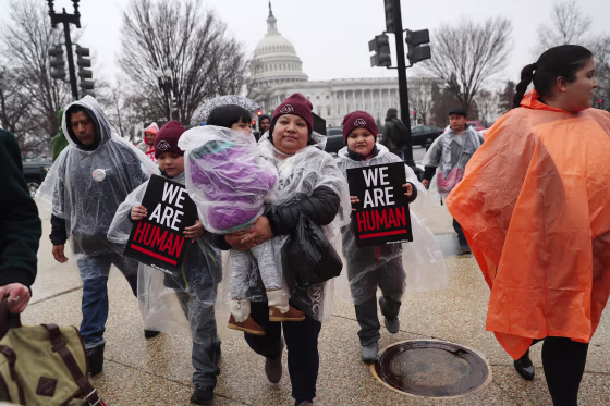 Image: Immigration activists march in front of the U.S. Capitol