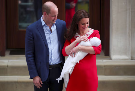 Image: Britain's Catherine, the Duchess of Cambridge and Prince William leave the Lindo Wing of St Mary's Hospital with their new baby boy in London