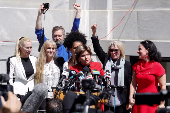 Image: Attorney Gloria Allred stands with accusers of actor and comedian Bill Cosby after a jury convicted him in a sexual assault retrial at the Montgomery County Courthouse in Norristown
