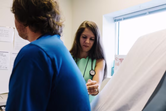 Image: Sinziana Bartleski, Family Nurse Practitioner, visits with a patient at Neighborhood Family Health Clinic in Charlottesville, Virginia on June 8, 2018.