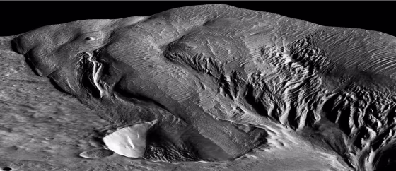 An 8-mile diameter crater being infilled by the Medusae Fossae Formation on Mars.