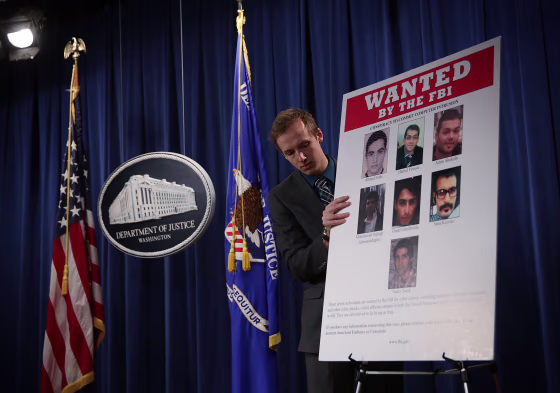 Image: Lynch And Comey Announce Charges In Cyberattack On U.S. Dam Linked To Iran