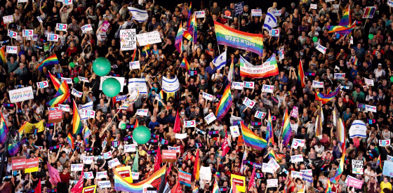 Image: Protesters hold a demonstration against a new surrogacy law in Tel Aviv