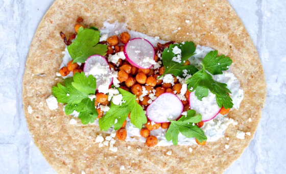 Parsley may look similar to cilantro, but it has a much milder flavor that makes a nice addition to sandwiches like this Spiced Chickepea Wrap.