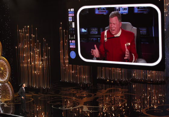 Image: Oscar host Seth MacFarlane watches William Shatner on a screen during the opening segment of the 85th Academy Awards in Hollywood