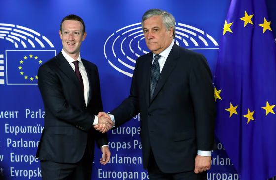 Image: Facebook's CEO Mark Zuckerberg shakes hands with European Parliament President Antonio Tajani at the European Parliament in Brussels
