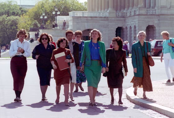 Rep. Patricia Schroeder, D-Colo., center, leads a delegation of congresswomen from the House to the Senate on Capitol Hill to voice their concerns on the nomination of Clarence Thomas
