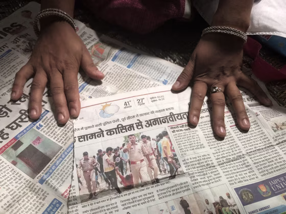 Image: A newspaper clipping featuring an image of Qasim Qureshi's lynching