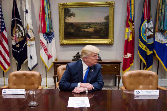 Image: US President Donald Trump (C) makes a statement from the Roosevelt Room
