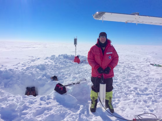 Study co-author Rick Aster holds a broadband seismometer during a station installation trip on the Ross Ice Shelf